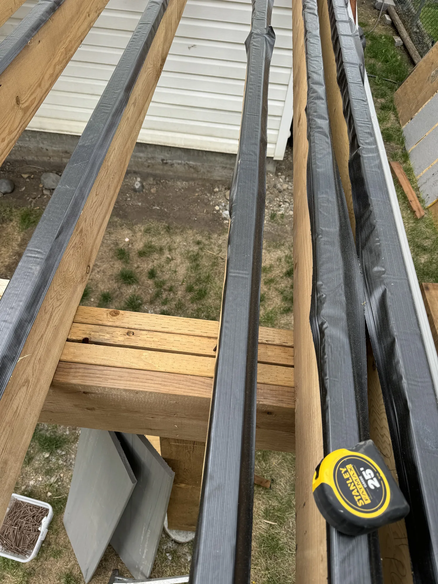 Close detail of deck railing installation