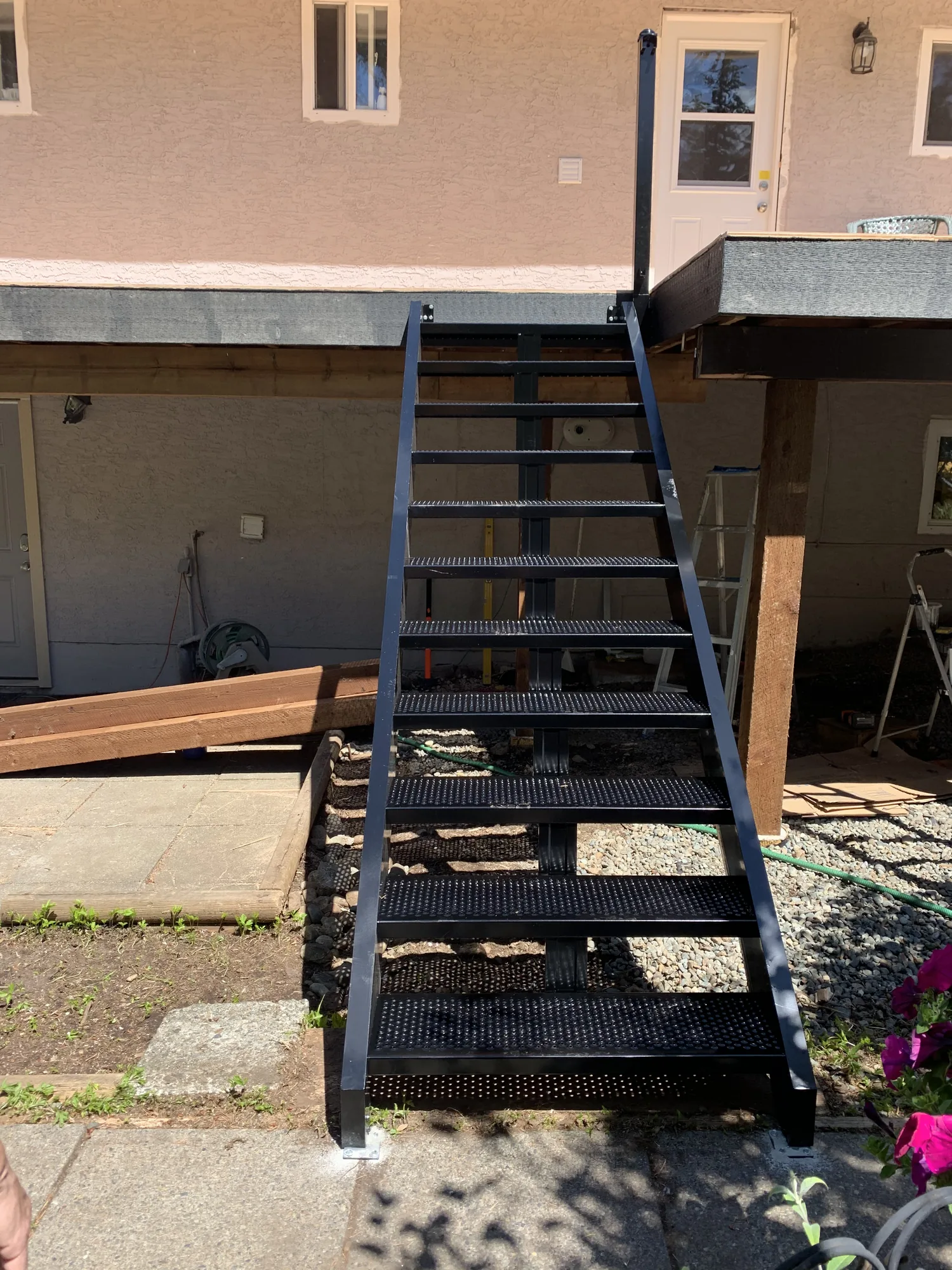 Black exterior stairs before rebuild