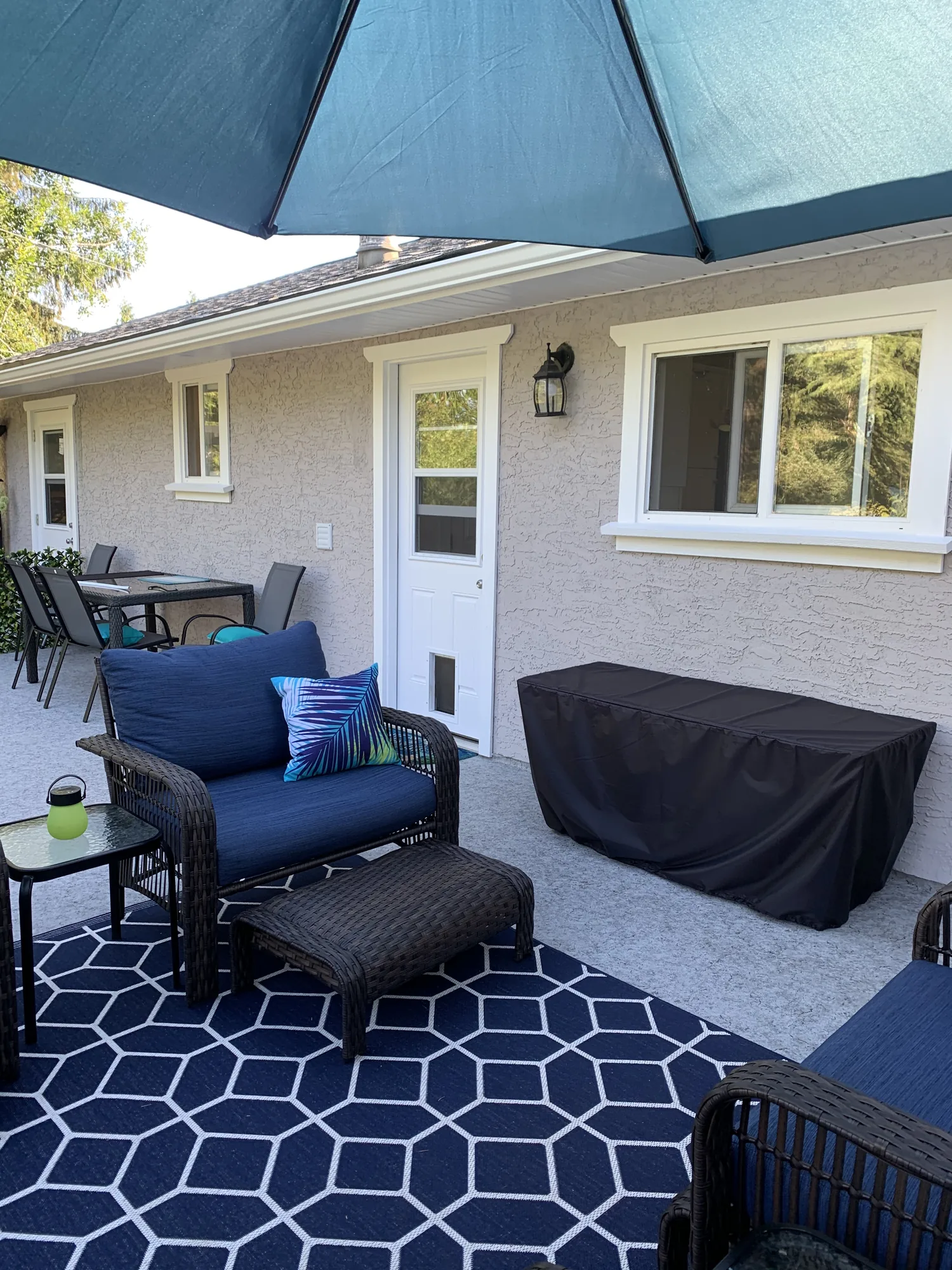 Finished patio seating with rug
